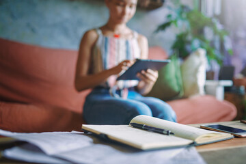 Still shot of notebook on coffee table