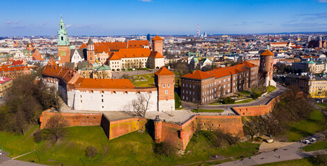 Naklejka na ściany i meble Aerial view of old Wawel Castle by the river in Krakov, Poland