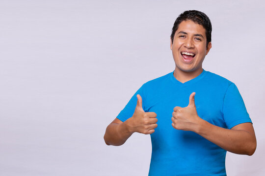 Latino Hispanic Man Thumbs Up Blue Shirt White Background