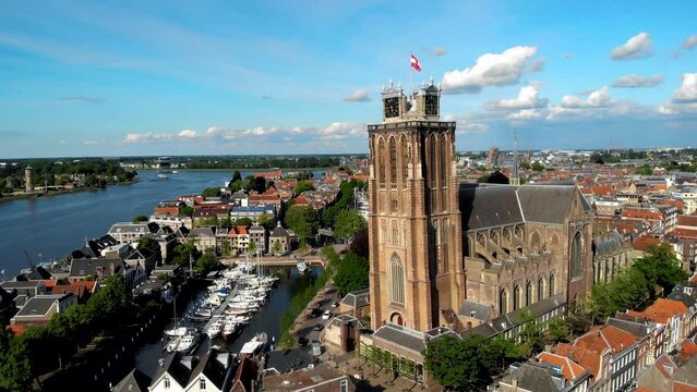 Dordrecht Netherlands, the skyline of the old city of Dordrecht with a church and canal buildings in the Netherlands. High quality 4k footage