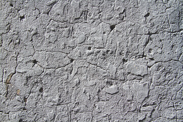 Texture of an old stone with a crack. Grunge brick texture.