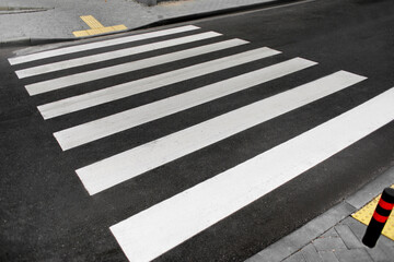 Pedestrian crossing on new asphalt road