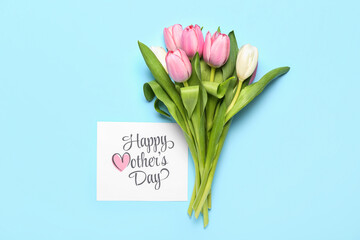 Card with text HAPPY MOTHER'S DAY and tulips on blue background