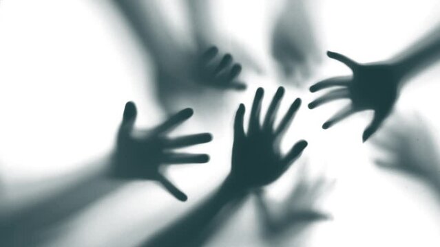 Shadow of a zombie hand on white background
