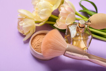 Beautiful tulips, decorative cosmetics and perfume bottle on color background