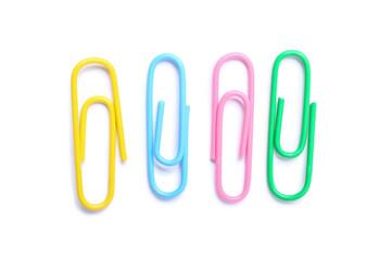 Colorful paper clips on white background, top view