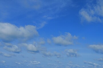 bright blue sky alternate with white clouds on clear days