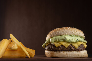 Hamburger - Snack with beef burger, green sauce, mozzarella cheese and fries