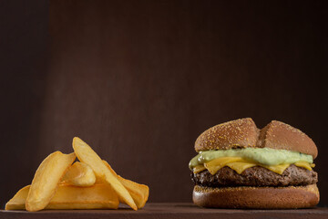 Hamburger - Snack with beef burger, green sauce, mozzarella cheese and fries