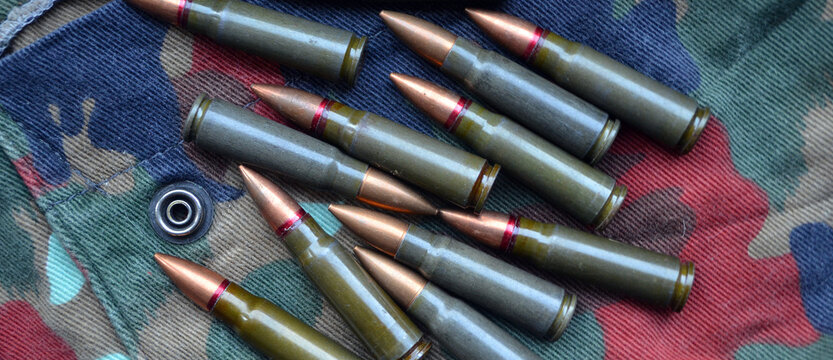 Ammunition 7,62x39 with camo background