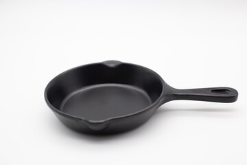Small pan, black for serving food, white background,Include Clipping Path.