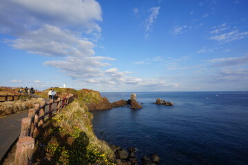 Obraz premium fine view with lighthouse and clouds