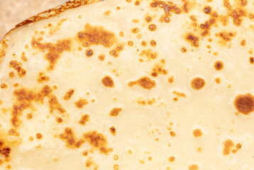 Pan fried pancake as a background.