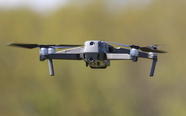 Drone in flight in the park.