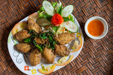 Fried chicken wing with fish sauce. Northeast Specialty Food of Thailand