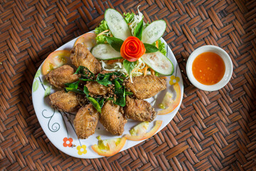 Fried chicken wing with fish sauce. Northeast Specialty Food of Thailand