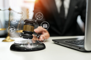 judge on wooden table And experienced lawyers meet with clients and give advice behind the scenes. legal services legal consulting concept