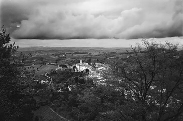 A storm gathering above the town of San Miniato in Tuscany, shot with analogue black and white film