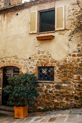 Fototapeta na wymiar Narrow medieval lanes of Castiglione della Pescaia, an old village on the Tuscan coast