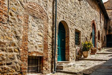 Narrow medieval lanes of Castiglione della Pescaia, an old village on the Tuscan coast