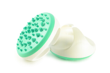 Hand massager with silicone spikes for anti-cellulite massage procedure isolated on white background. Massage brush tool for problem body zone, self-care, health care, body therapy.
