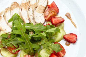 chicken fillet with salad and sauce