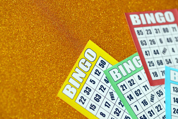 Many colorful bingo boards or playing cards for winning chips. Classic US or canadian five to five...