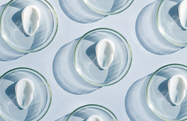 pattern petri dish with cream smear sample on light background - obrazy, fototapety, plakaty