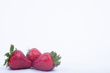 Delicious fresh red strawberries on white background