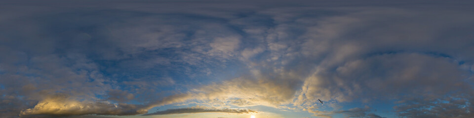 Dramatic sunset sky panorama with Cumulus clouds. Seamless hdr 360 pano in spherical equirectangular format. Complete zenith for 3D visualization, game and sky replacement for aerial drone panoramas