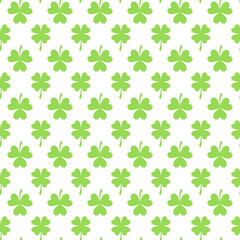 White seamless pattern with green clover.