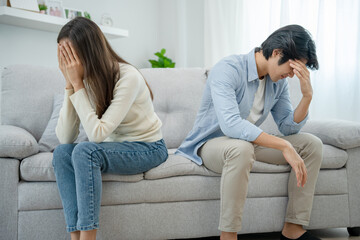 Fototapeta premium Divorce. Women and men feel frustrated, bored, stressed, upset, and irritable after a fight. The couple had family problems leading to a divorce. Love problems.