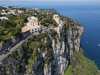 Fototapeta na wymiar Aerial view of Marina Grande in Capri, an island located in the Tyrrhenian Sea off the Sorrento Peninsula, on the south side of the Gulf of Naples in the Campania region of Italy. Drone view of Capri.