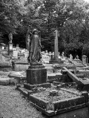 Ornate 19th century graveyard in Wales - monochrome.