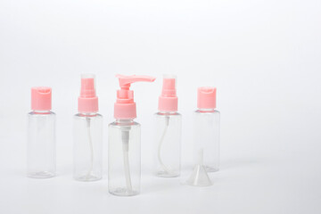 Travel set of plastic transparent containers for cosmetics.