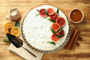 Concept of tasty dessert with meringue pie with citrus, top view