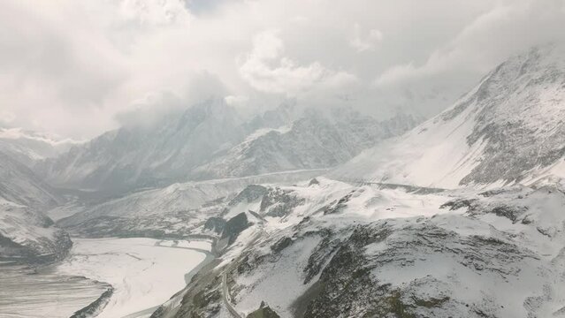 Drone Shot Over Frozen Pasu Glacier Landscape In Pakistan. Dolly Back, Circle Dolly