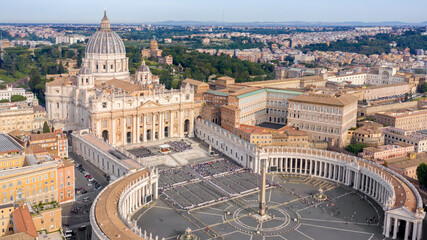 Aerial view of Papal Basilica of Saint Peter in the Vatican located in Rome, Italy, before a weekly general audience. It's the most important and largest church in the world and residence of the Pope. - obrazy, fototapety, plakaty