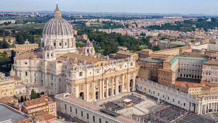 Fototapeta na wymiar Aerial view of Papal Basilica of Saint Peter in the Vatican located in Rome, Italy, before a weekly general audience. It's the most important and largest church in the world and residence of the Pope.