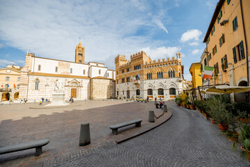 Morning view on Piazza Dante, central square in Grosseto town on sunny day. This city is the center of Maremma region at western central Italy