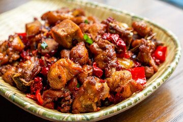A classic dry fragrant and delicious Sichuan dish, spicy chicken