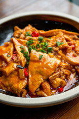 A classic and delicious Chinese dish, braised farm tofu in sauce