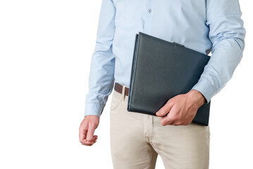 Man in light blue shirt and beige pants holding a folder under his arm on a white background