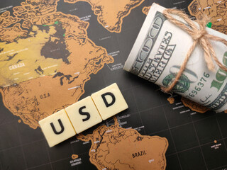 Top view toys word and banknotes with the word USD.