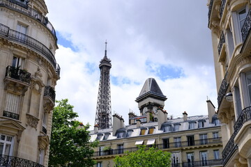 Fototapeta na wymiar A view of the tour Eiffel from the Edmond Valentin street. Paris, France. The 24th may 2022.