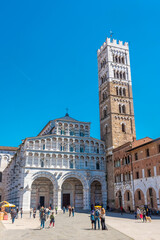 Lucca, Italy,  18 April 2022: View of Lucca Cathedral - obrazy, fototapety, plakaty