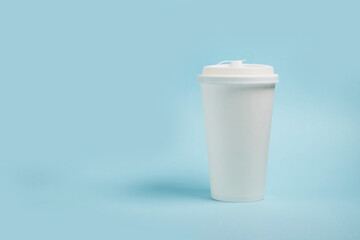 White paper coffee cup with plastic lid