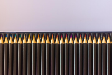 many crayons in selective focus