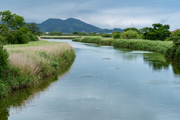 View of stream run through in a rural area in Japan.