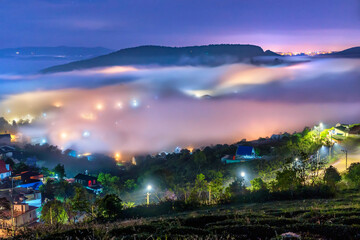 Fototapeta na wymiar The evening landscape in the valley falling asleep with fog covered is so fuzzy, so beautiful and peaceful